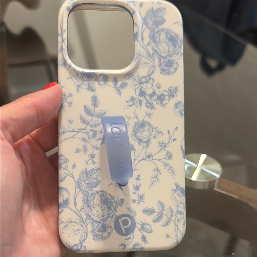 Blue and Cream Floral Loopy Iphone15Pro phone case.